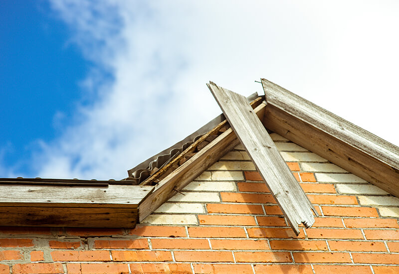 Torn Off By A Hurricane Wind Board On The Roof